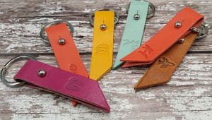 debossed key rings in variety of colours