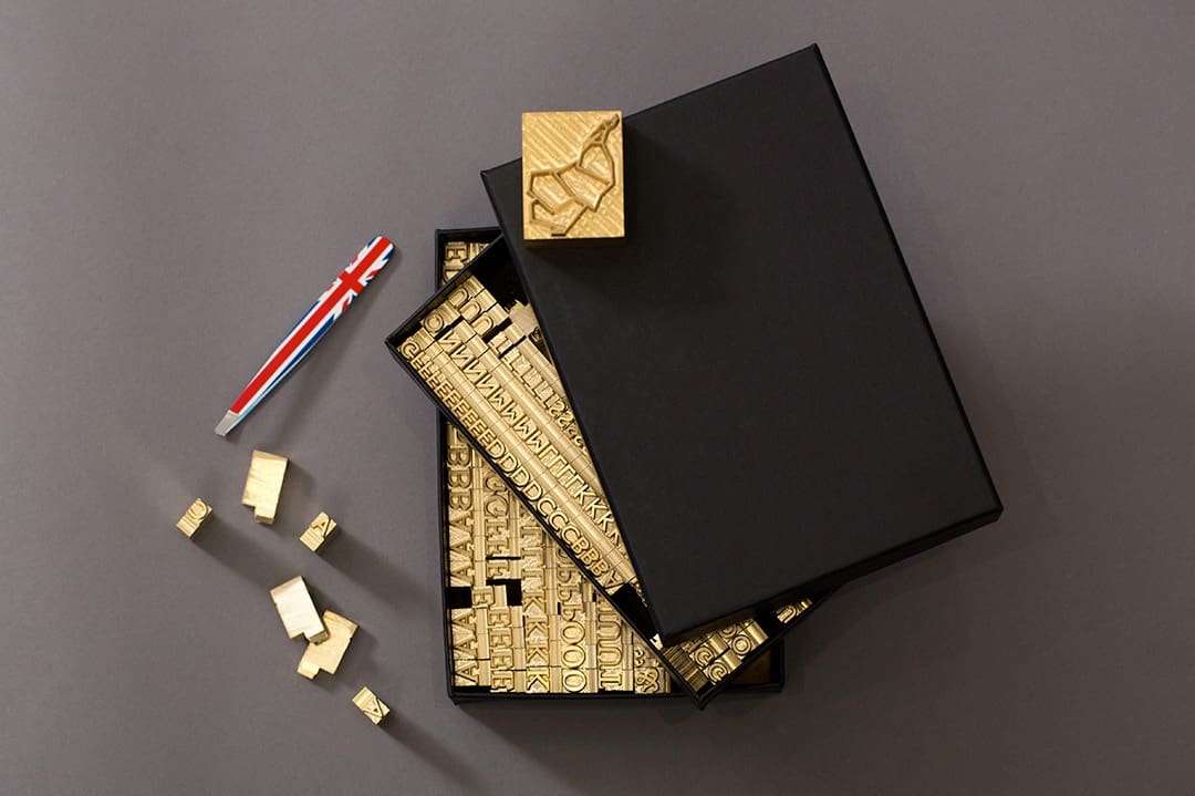 Brass type set with lettering for personalising products