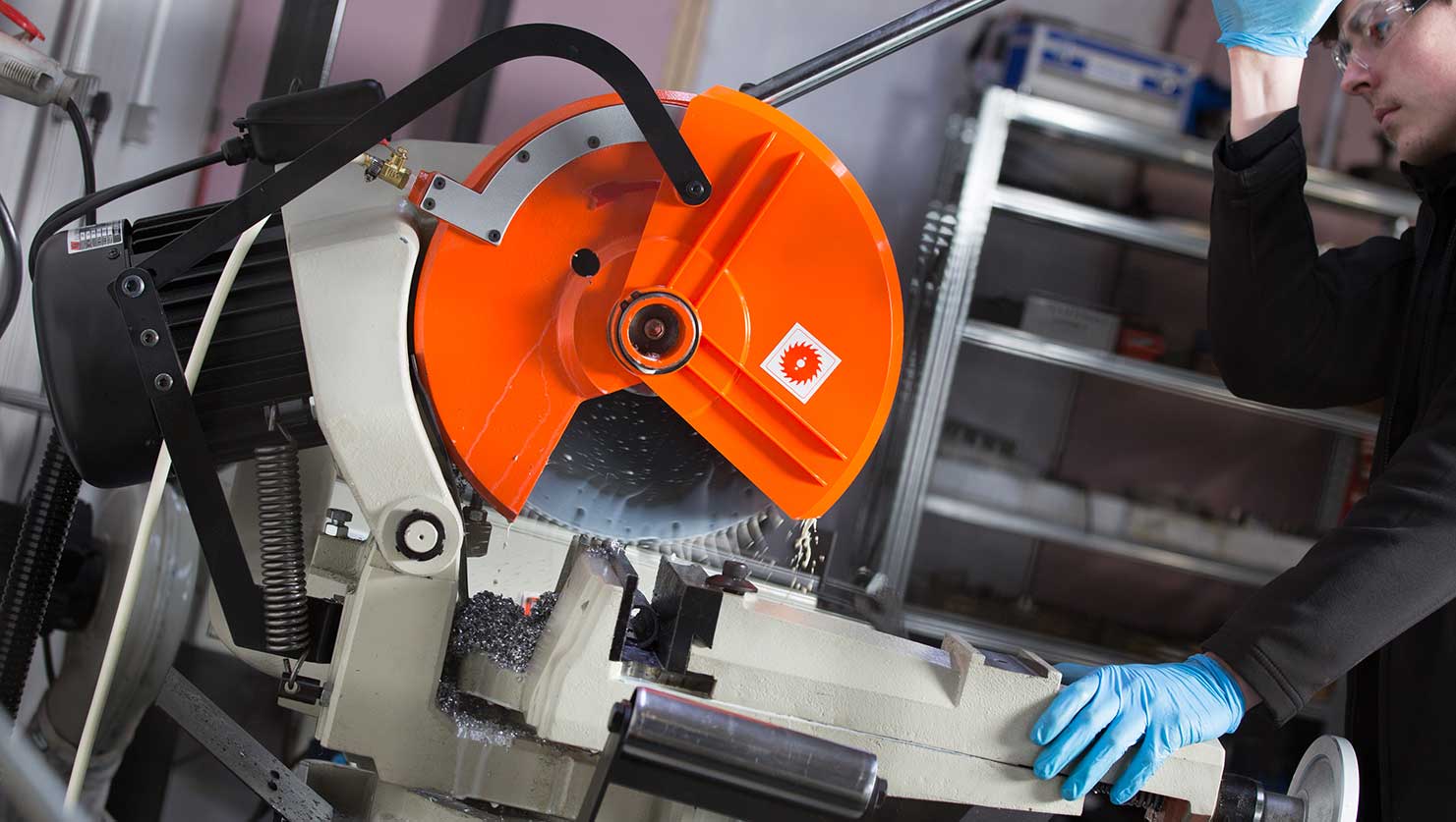 a hot foil printing machine being repaired