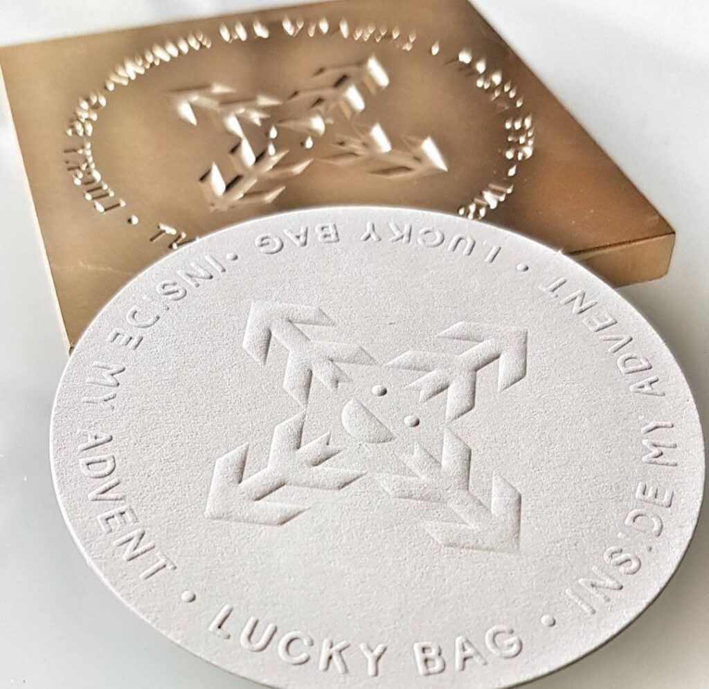 Close up of a branded die